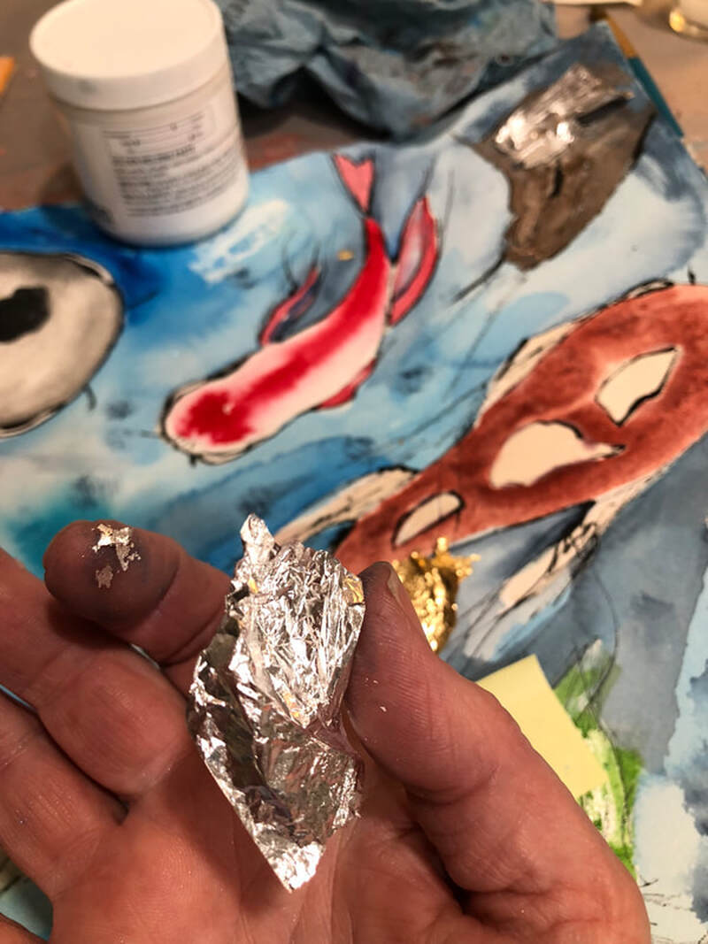 Real Silver Leaf.  Not aluminum :)